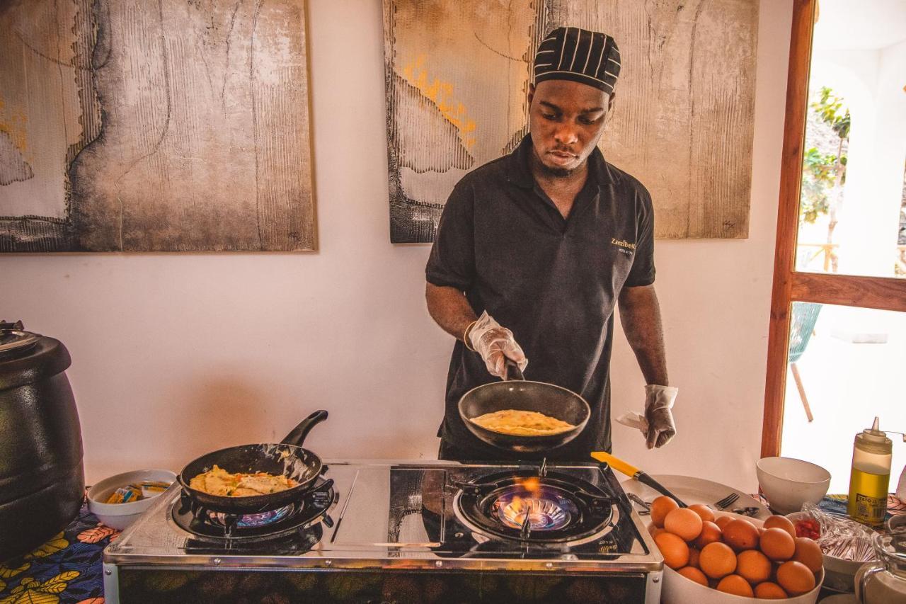 Zanzibella Hotel & Spa Kiwengwa  Dış mekan fotoğraf A chef cooking