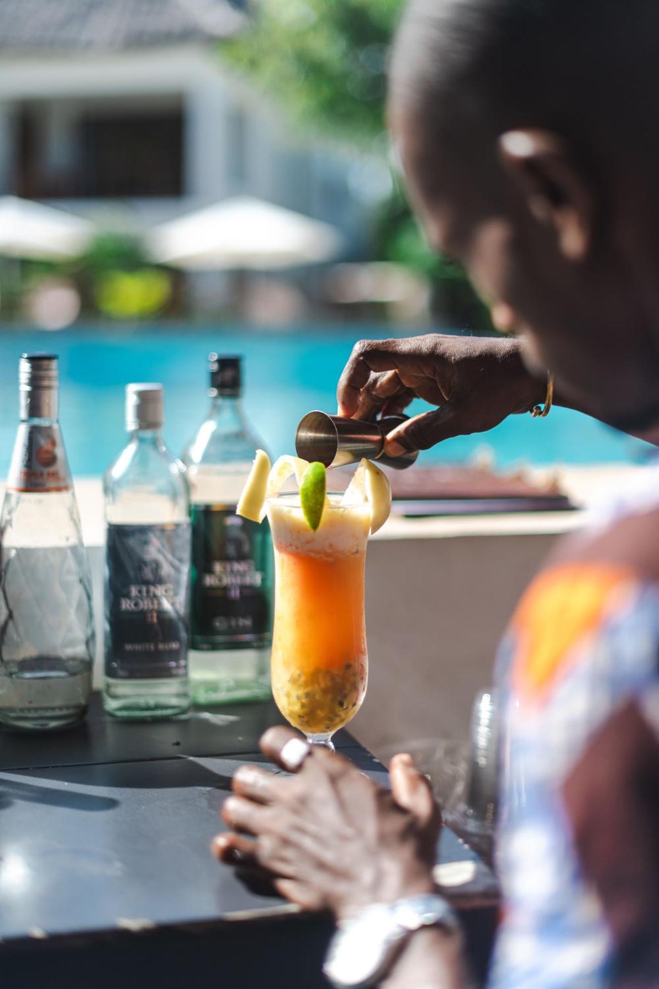 Zanzibella Hotel & Spa Kiwengwa  Dış mekan fotoğraf A bartender preparing a cocktail